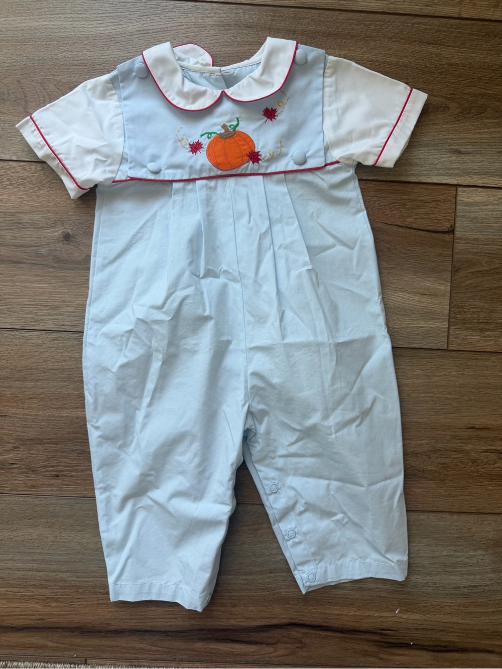 Petit Ami White Romper with Orange Pumpkin and Red Trim